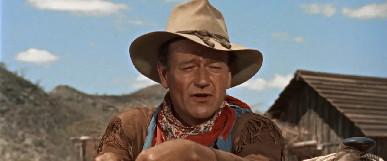 Hondo, l'homme du désert - D'abord, elle avait peur qu'il reste… Puis elle a eu peur qu'il ne le fasse pas. – image d’arrière-plan
